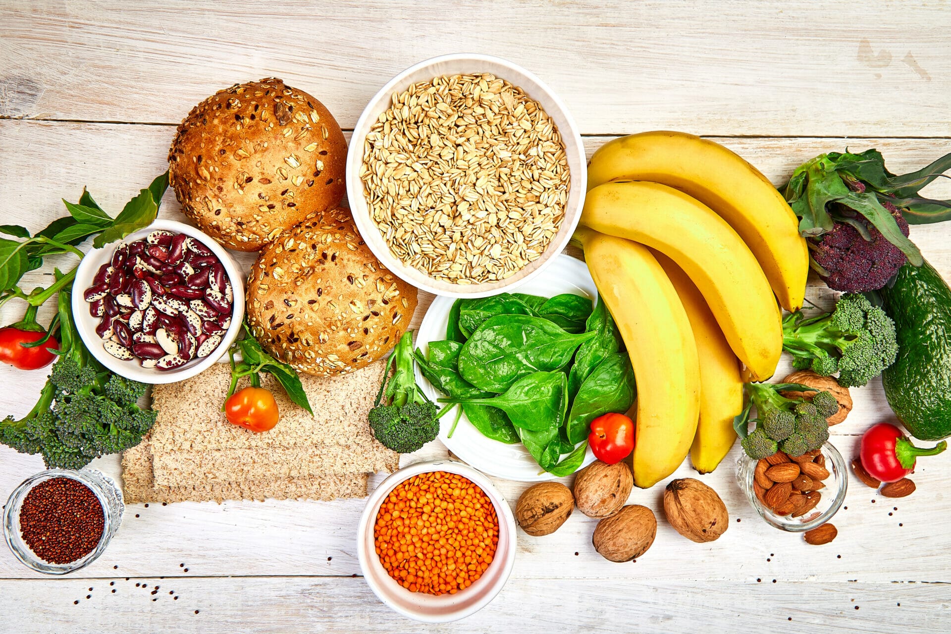 Selection food rich in fiber on white wooden background, Healthy diet food product. Top view, flat lay, copy space.