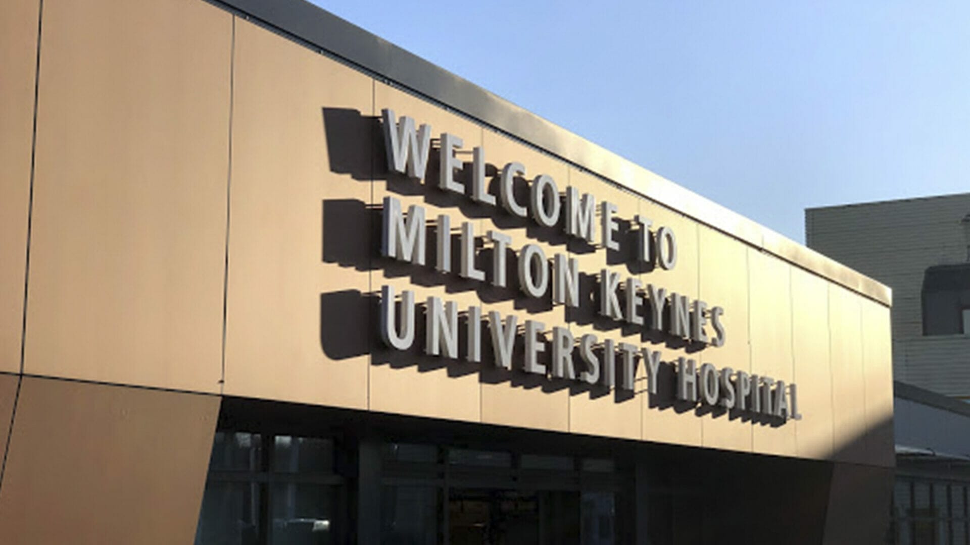 image of a sign saying 'Welcome to Milton Keynes University Hospital'